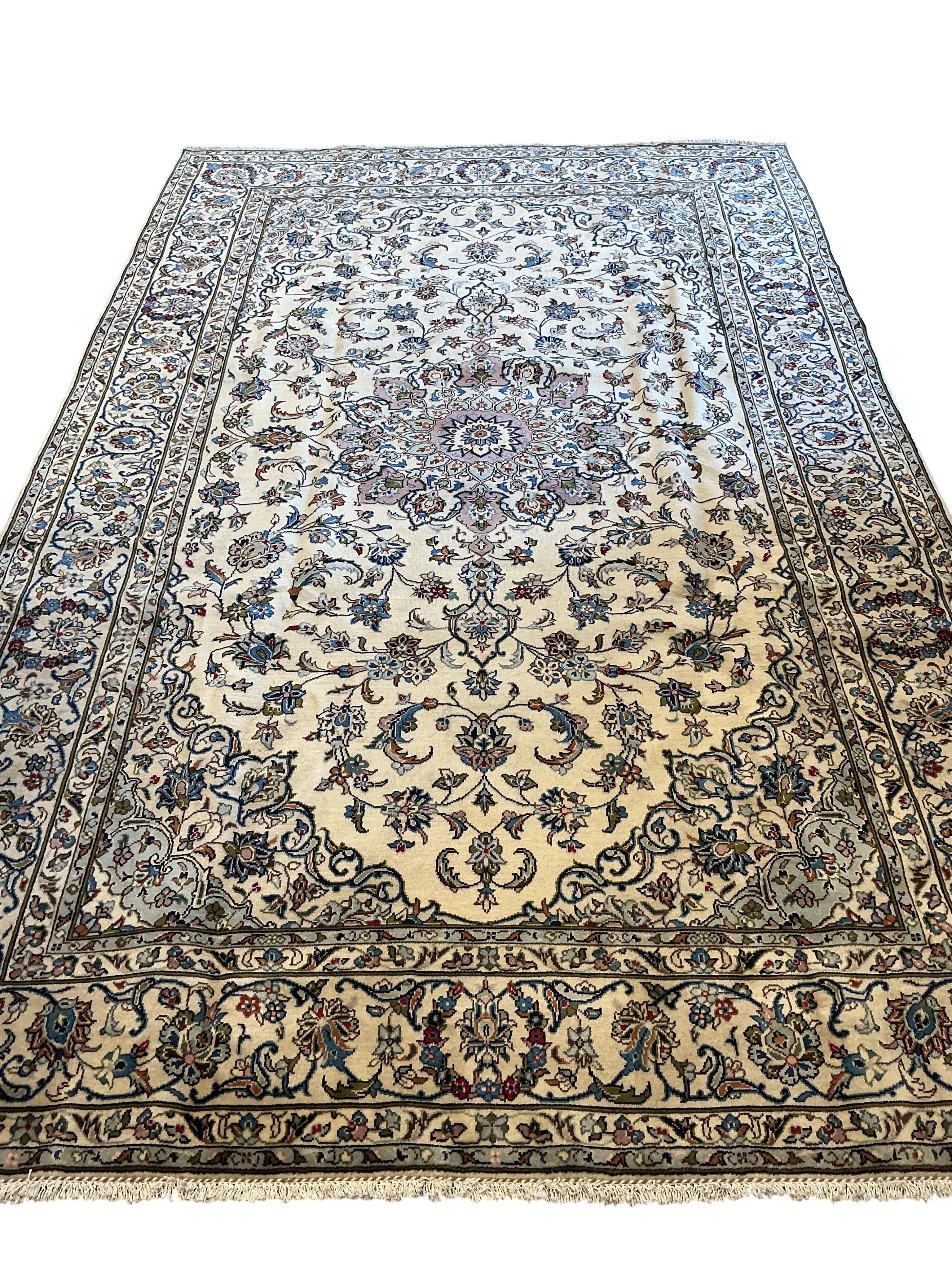 A Kashan pale blue ground carpet, 315 x 201cm